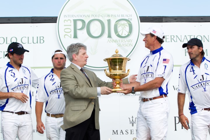 Larry Boland presenting the Piaget Gold Cup to Valiente